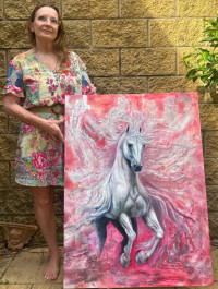 Jeanne Musgrave with one of her paintings on display at Pomona Railway Station Art Gallery until January 30